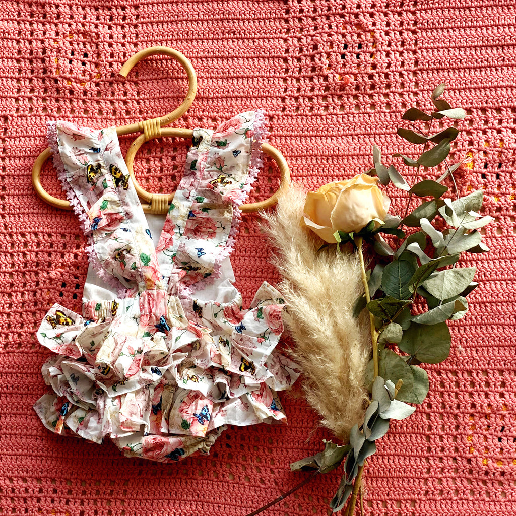 Cannes Romper in Butterfly Floral Fabric with star lace details